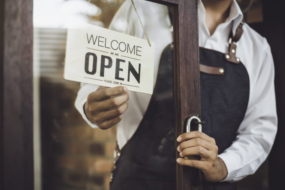Open sign in the window of a business