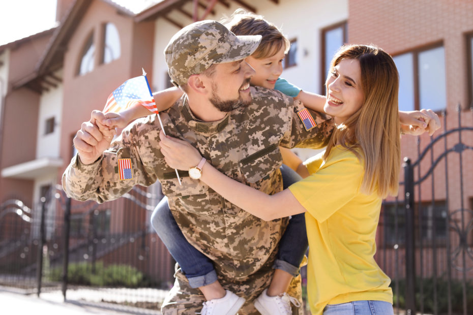 military family hugging